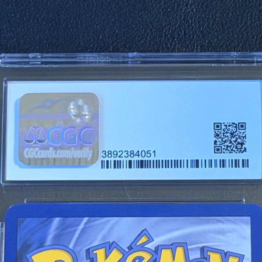 Pokemon Omanyte 1st Edition Fossil 52/62 CGC 9 Mint Blue Label TCG 1999 WotC Vtg